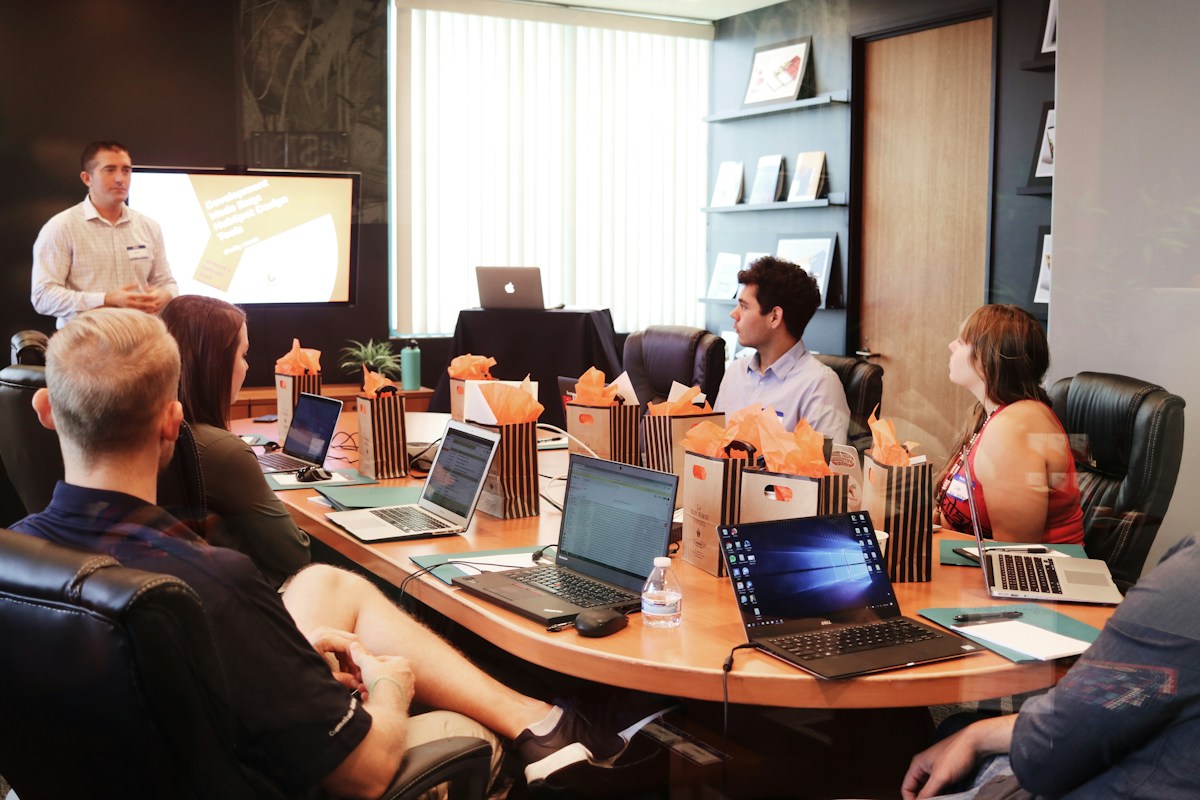 Creative team sharing campaign concepts during a collaborative studio session